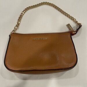 Tan Small Michael Kors bag able to be worn as wristlet or shoulder bag